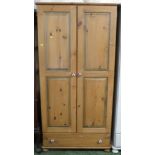 TWO DOOR PINE WARDROBE WITH DRAWER TO BASE AND DECORATIVE CERAMIC HANDLES