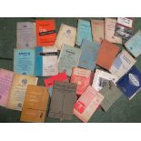 FIVE SHELVES OF VINTAGE CAR MANUALS, REPAIR MANUALS AND PARTS CATALOGUES, ETC