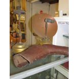 TILLEY RADIATOR, VINTAGE BRASS HEAT LAMP, AND A PAIR OF BROWN LEATHER GAITERS