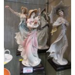 FOUR GIUSEPPE ARMANI FLORENCE RESIN FIGURINES OF WOMEN ON SQUARE BASES