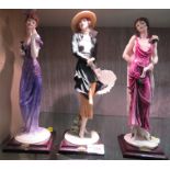 THREE GIUSEPPE ARMANI FLORENCE RESIN FIGURINES OF WOMEN ON SQUARE BASES