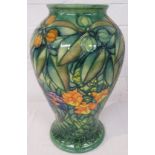 Large limited edition Moorcroft Pottery Rain Forest baluster vase, green with tubelined decoration