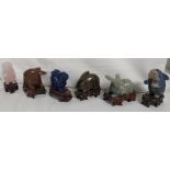 Six Chinese carved stone and quartz rabbits, (rose quartz, grey quartz, lapis lazuli, tiger's eye,