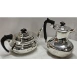 Mappin and Webb silver teapot with ebonised handle and finial and engraved with initials E G B,