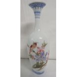 Chinese porcelain slender baluster vase, white ground enamelled with bird in blossom branches and