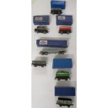 Six boxed Hornby Dublo D1 wagons - bogie bolster wagon (BR), oil tank 'Royal Daylight', low-sided