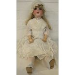 Armand Marseille doll marked 390 10 M, with porcelain head and composition body, wearing dress and