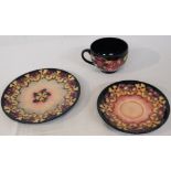 Moorcroft Pottery Oberon cup, saucer and plate, stamped MOORCROFT MADE IN ENGLAND, gate device and