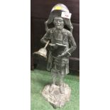 CAST METAL FIGURAL DOOR STOP IN FORM OF TOWN CRIER WITH BELL MARKED 'MADE IN ENGLAND'