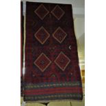 RED GROUND WOVEN WOOLEN MESHWANI FLOOR RUNNER WITH MULTIPLE MEDALLIONS, 257CM BY 66CM