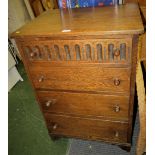 STAINED OAK CHEST OF FOUR DRAWERS WITH LINENFOLD TOP DRAWER WITH ACORN HANDLES