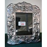 BIRMINGHAM SILVER CLAD MAHOGANY PHOTO FRAME DECORATED WITH CHERUBS