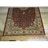 RED AND BEIGE GROUND FINELY WOVEN PATTERNED FLOOR RUG WITH TASSELED ENDS