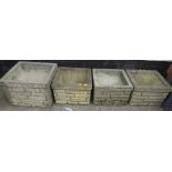 FOUR STONE SQUARE GARDEN POTS WITH BRICK DESIGN