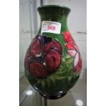 MOORCROFT OVOID VASE DECORATED WITH FLOWERS