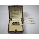 9-CARAT GOLD RING SET WITH THREE GARNETS, GROSS WEIGHT OF RING 3.3G, WITH BROWN LEATHER CLAD RING