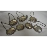 SEVEN HALLMARKED SILVER DECANTER LABELS - WHISKY, BRANDY, GIN, PORT (TWO) AND SHERRY (TWO)