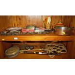 HORSE BRASSES, METAL TRIVETS, CANE CARPET BEATER, CERAMIC TUREEN AND OTHER ITEMS (TWO SHELVES)