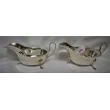 PAIR OF SHEFFIELD SILVER SAUCE BOATS ON THREE FEET (4.1 OZT AND 4.0 OZT)