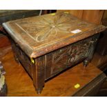 SMALL CARVED OAK LIFT TOP BOX ON LEGS