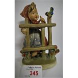 HUMMEL FIGURE OF GIRL WITH BIRD ON FENCE, NUMBERED 203