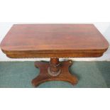 19th century rosewood veneer card table, folding top with black cloth, supported on a column with