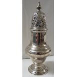 Spink & Son Victorian silver baluster mufineer or sugar caster, pierced wrythen dome with finial, on