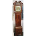 A thirty hour long case clock by F Cottell of Crewkerne with engraved brass and silvered dial. The