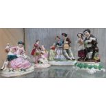 Four porcelain figural groups - (1) Dresden style lady and gentleman 'The Harpists', oval base,