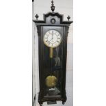 A Victorian eight day regulator in an ebonised and glazed case with canted and reeded sides and