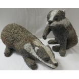 Gil Tregunna studio pottery figure of a crouching badger, signed, length 41cm, together with a
