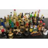 Assorted liqueurs, spirits and cider miniatures, some in ceramic and novelty bottles - Adan,