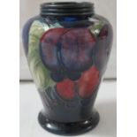 Moorcroft Pottery squat baluster vase, blue ground with tubelined decoration of plums, ribbed