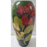 Tall ovoid Moorcroft vase, green graduating to blue at the foot with tubelined decoration of red and