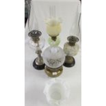 Four oil lamps (including one converted to electricity - needs rewire) - (1) a brass lamp with a mo