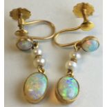 Pair of 9 carat gold pendant opal and seed pearl earrings, each with a circular opal (about 4mm) and