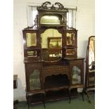 Maple & Co Victorian taste mirror back display sideboard with carving and pierced work, the tall