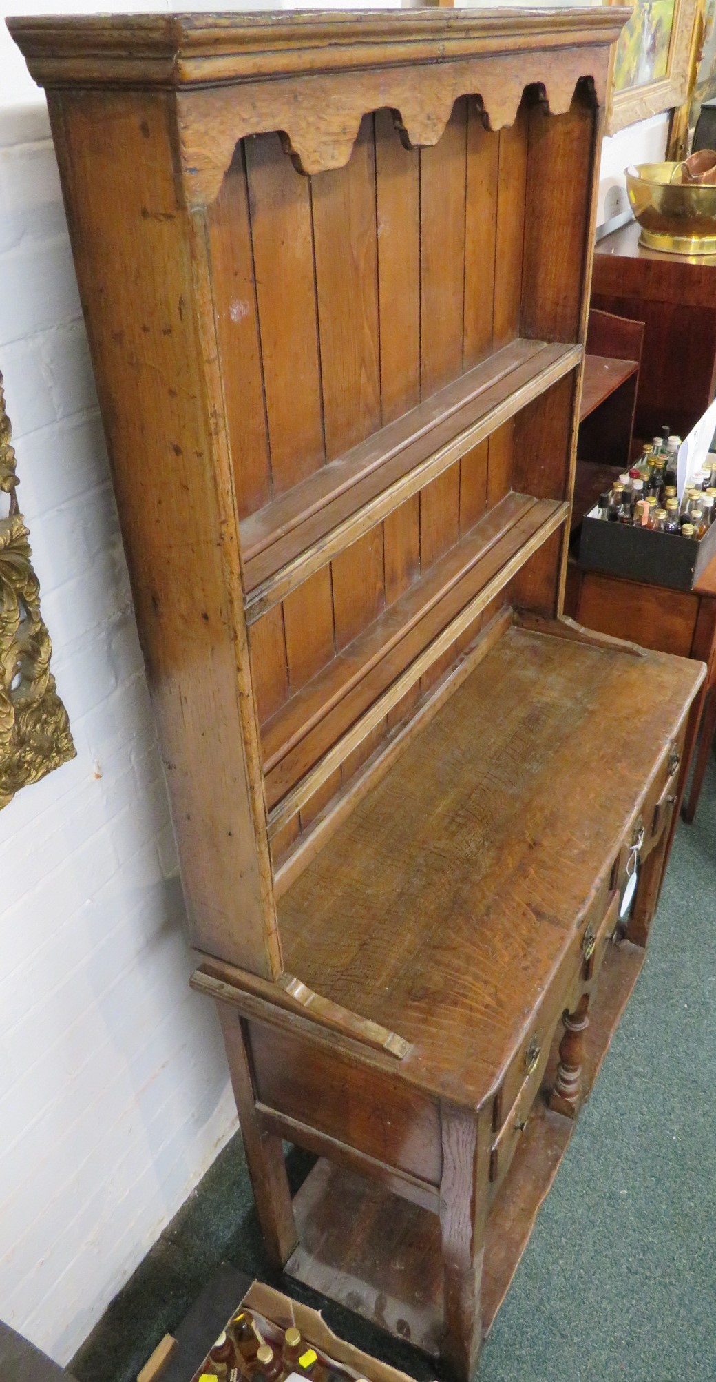 A small oak dresser (height 162cm, width 92cm, depth 37cm), the upper section with wavy - Image 7 of 7