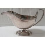 Silver sauce boat on oval foot, marks for Sheffield, 1964, indistinct maker's stamp, 9.6 ozt