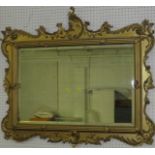 Bevelled rectangular wall mirror with a broad gilt wood frame with gesso acanthus scroll