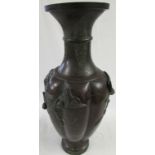 Japanese style bronzed metal baluster vase moulded in high relief with birds in branches, the body