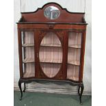 A Victorian mahogany serpentine fronted china display cabinet with ebony and boxwood stringing and