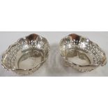 Pair of small oval silver bonbonnieres with foliate piercing, marks for Birmingham, 1926, maker's