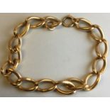 18 carat gold bracelet, sixteen links each stamped 18, the spring clasp link stamped 9C, length of