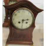 WBK & Fils Paris mahogany serpentine cased striking mantel clock, flame mahogany veneer front