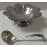 Silver bon bon dish of round eight-petal flower shape on stepped circular foot, marks for London,