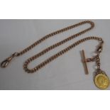 9 carat gold Albert watch chain suspending a mounted Edward VII 1910 half sovereign, gross weight of