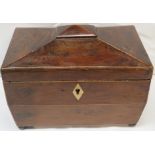 A walnut veneer casket shape tea caddy, inlaid lozenge escutcheon and stringing, embossed fruit