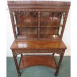 Edwards & Roberts Chippendale style glazed cabinet on stand, the two-door cabinet with Gothic