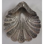 Silver shell-shape entree dish with engraved and repousse foliage, on three spiral shell feet, marks